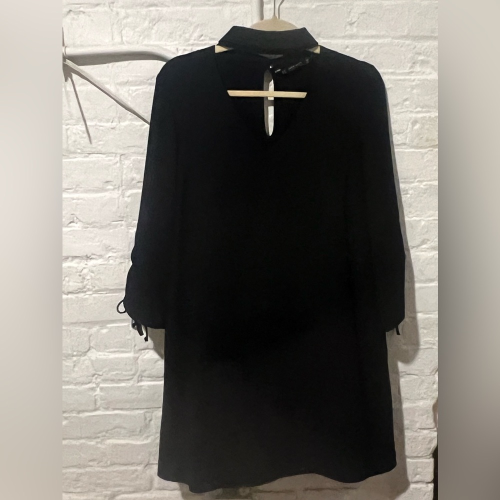 Zara navy dress with ruched sleeves.